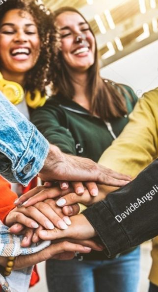 stock-photo-multiracial-happy-young-people-stacking-hands-outside-diverse-friends-unity-togetherness-in-2217189381